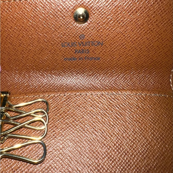 Authentic Louis Vuitton 4 key holder w/ authentication card. - Picture 8 of 10